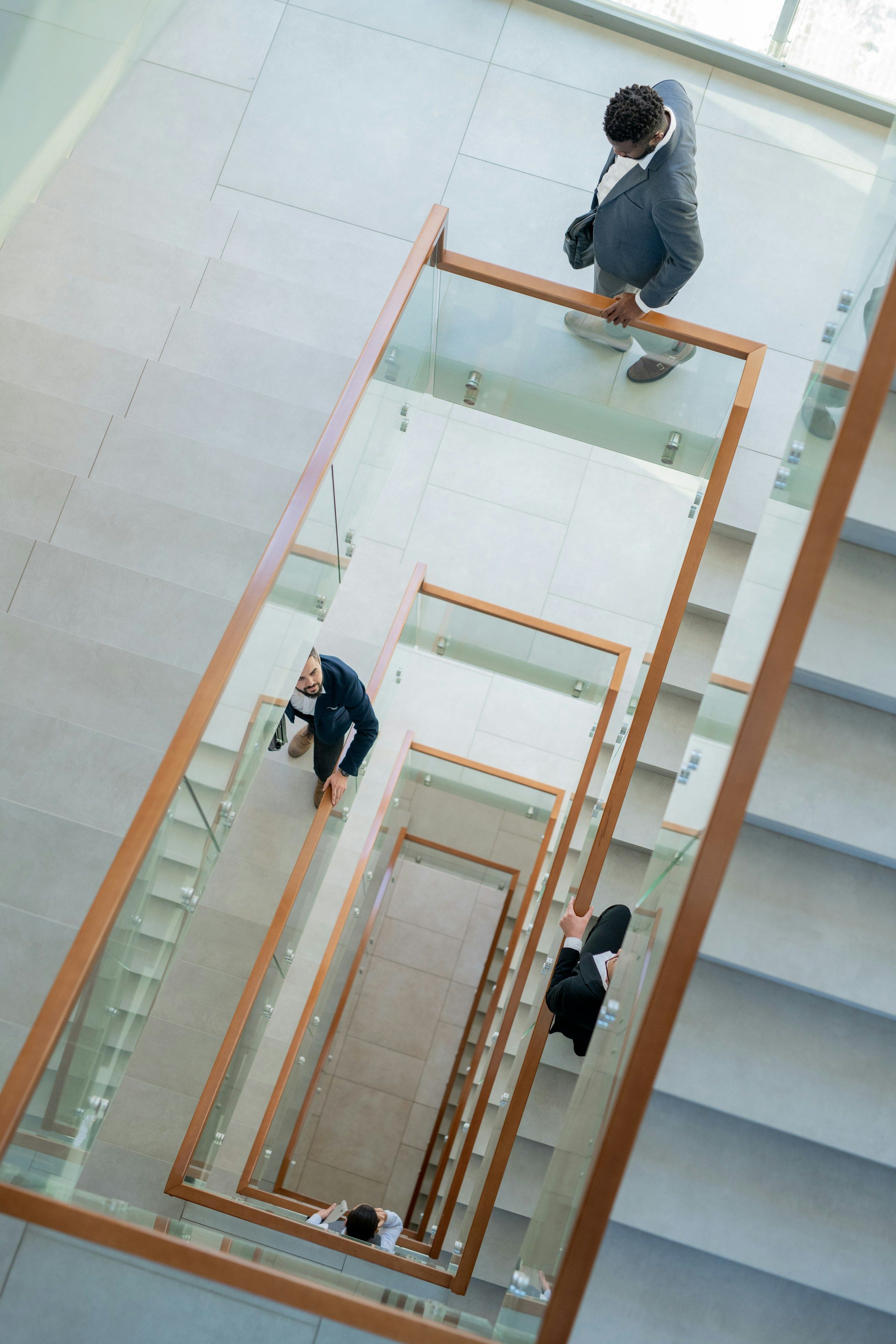 Finance professionals walking down the stairs