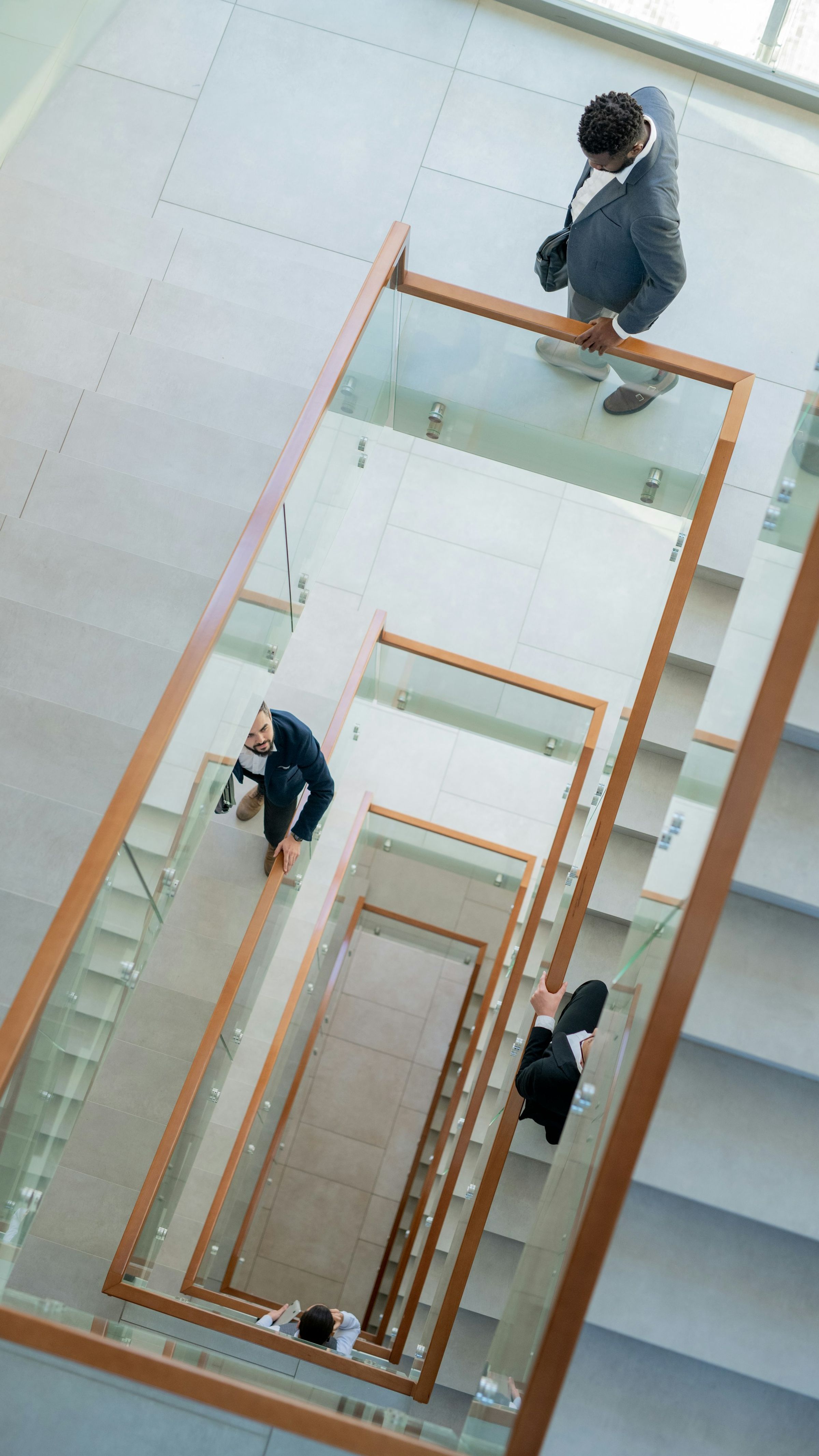 Finance professionals walking down the stairs