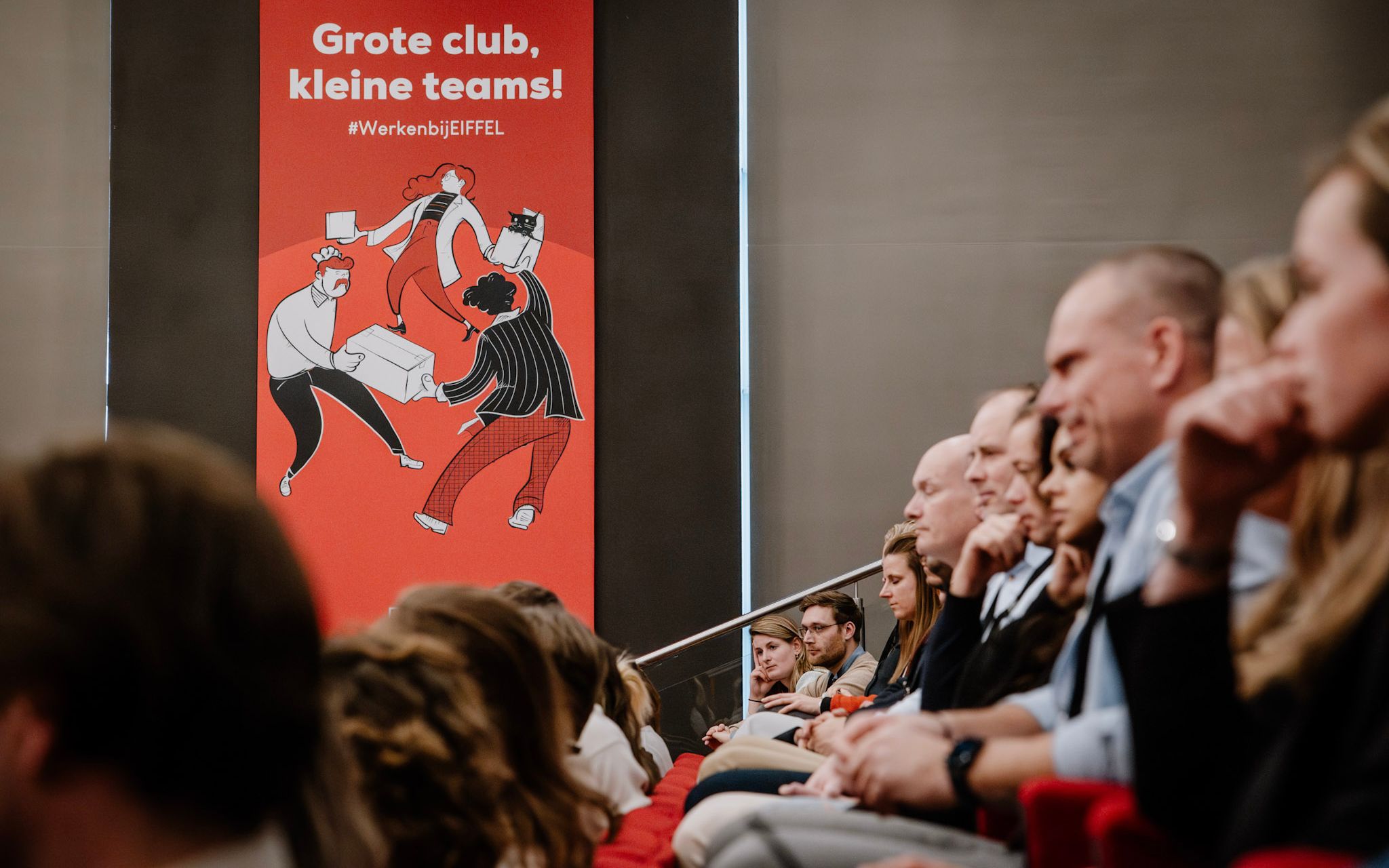 Mensen in auditorium