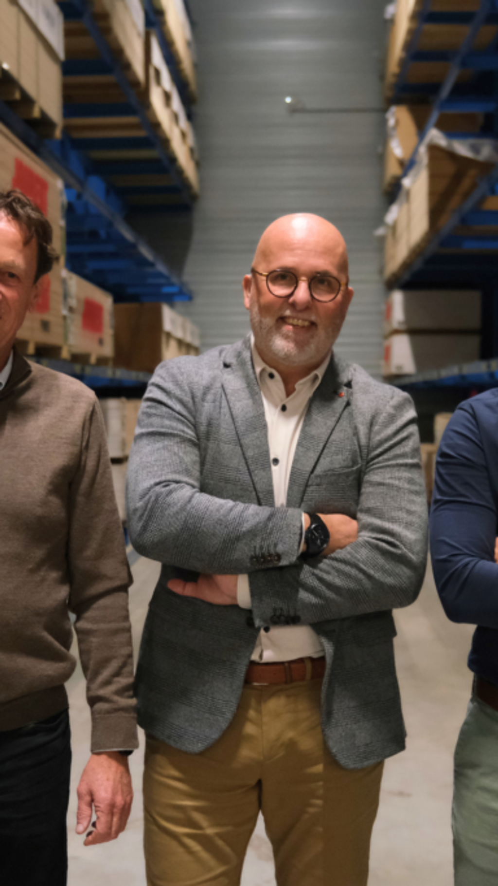 Theo, Harrie en Malte in een magazijn