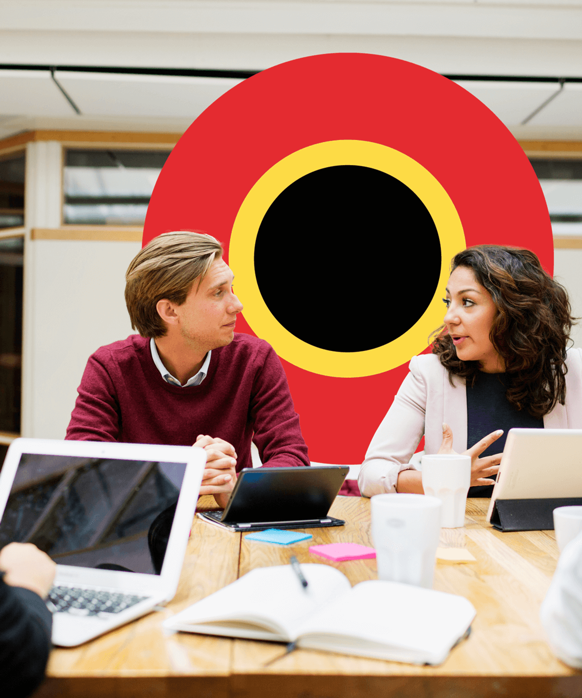 Vier collega's in een meeting