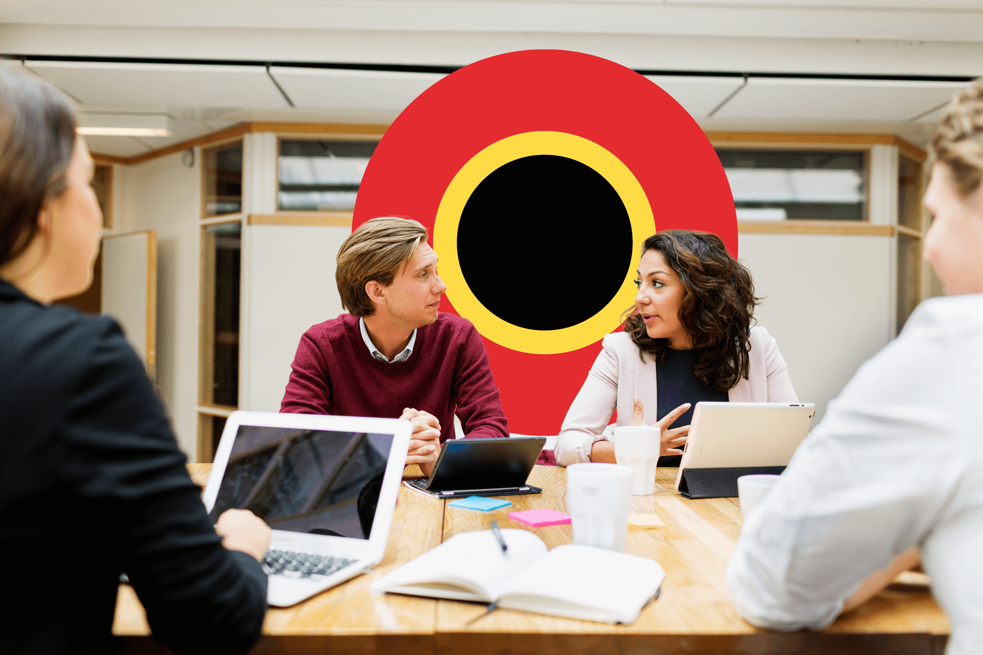 Vier collega's in een meeting