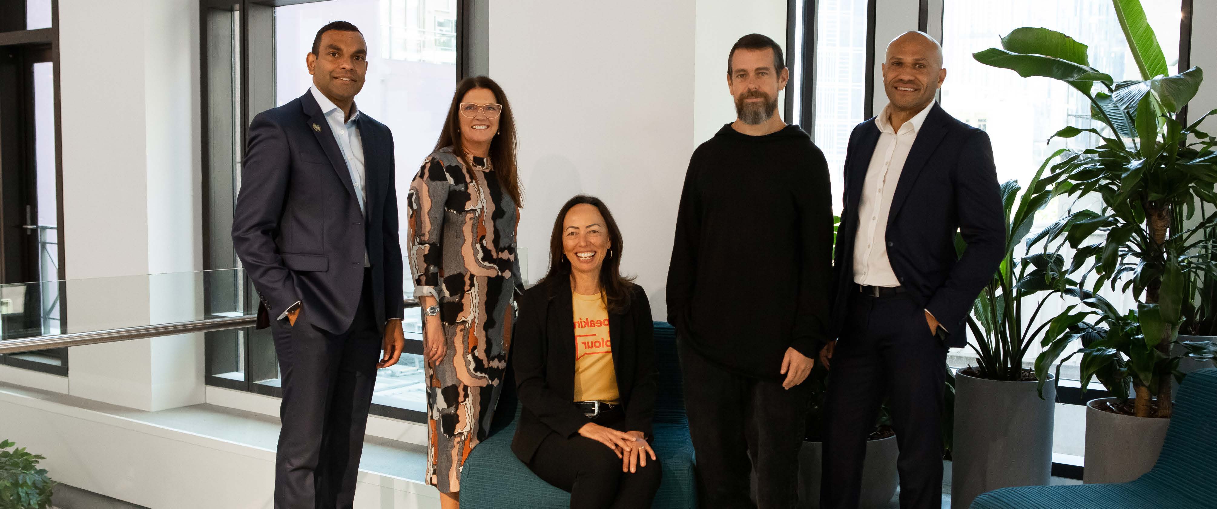 Block Head Jack Dorsey standing with employees of First Australians Capital. 