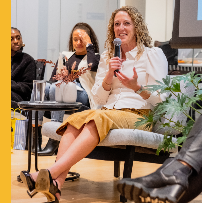 Block Board of Directors member Amy Brooks speaks at an event.