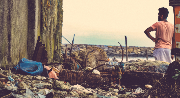 A pile of trash on the beach.