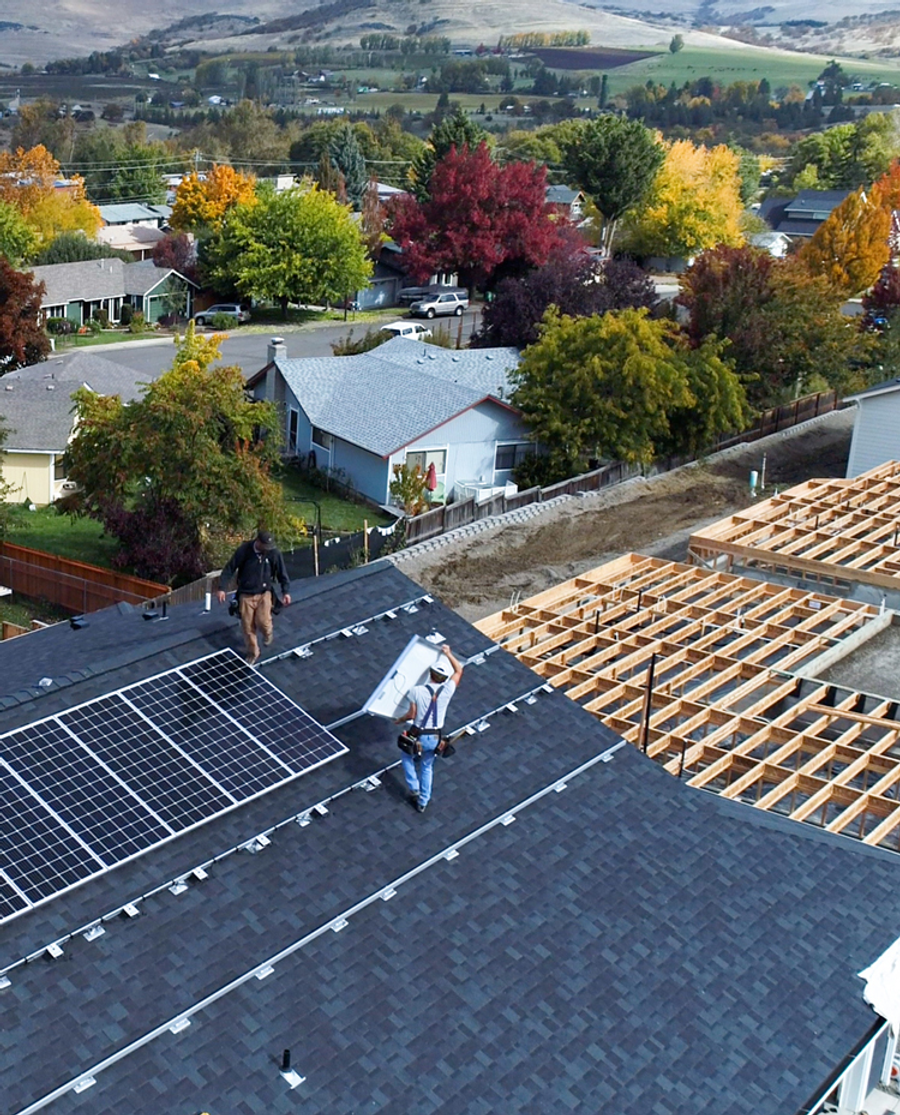 Aerial view of a completed rooftop solar system
