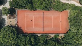 Tennis court in the forest at Sablière