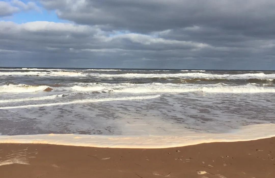 Rough ocean at Blooming Point Nude Beach in Prince Edward Island, Canada