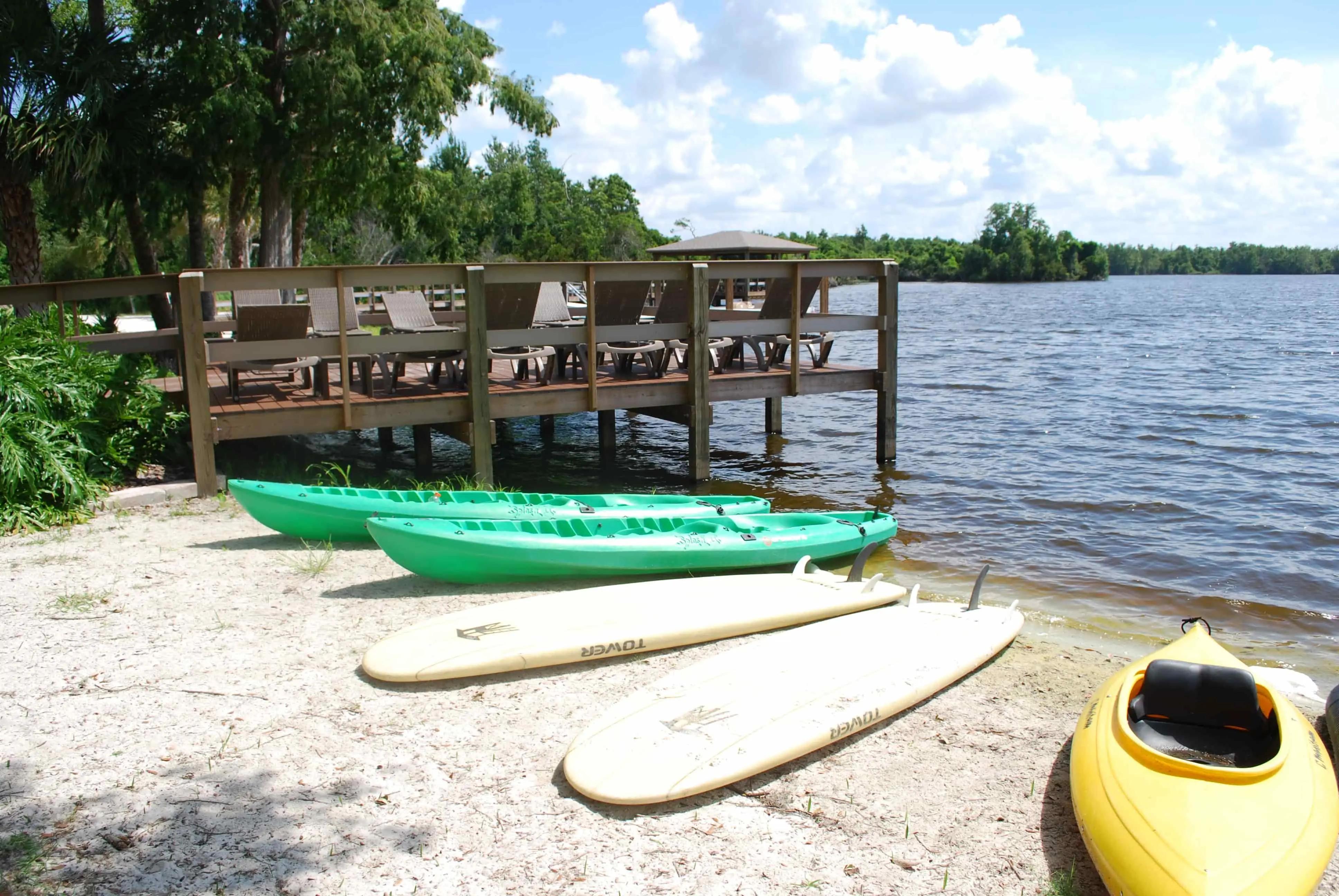 Enjoy the pool or lake area at Cypress Cove Nudist Resort