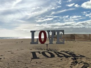Sign at Playa de Maspalomas, nude beach in Spain