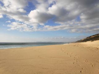 Early or late summer is the best time to experience the beach without crowds