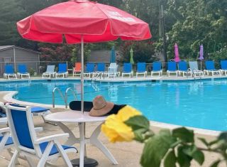 Outdoor pool at Pine Tree Associates - naturist resort Maryland
