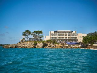 Grand Lido Negril Au-Naturel Resort sits at the end of the point