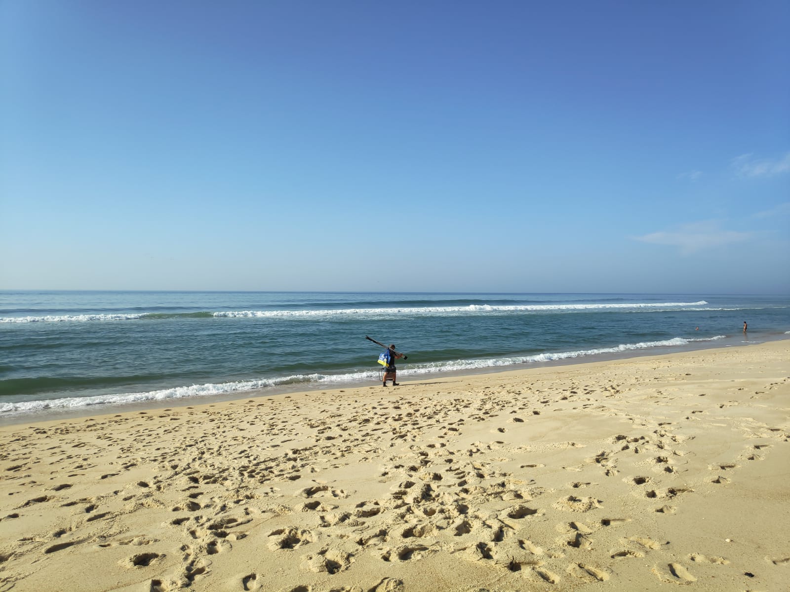 Friendly locals are always willing to chat to visitors here at Praia das Pedras Negras