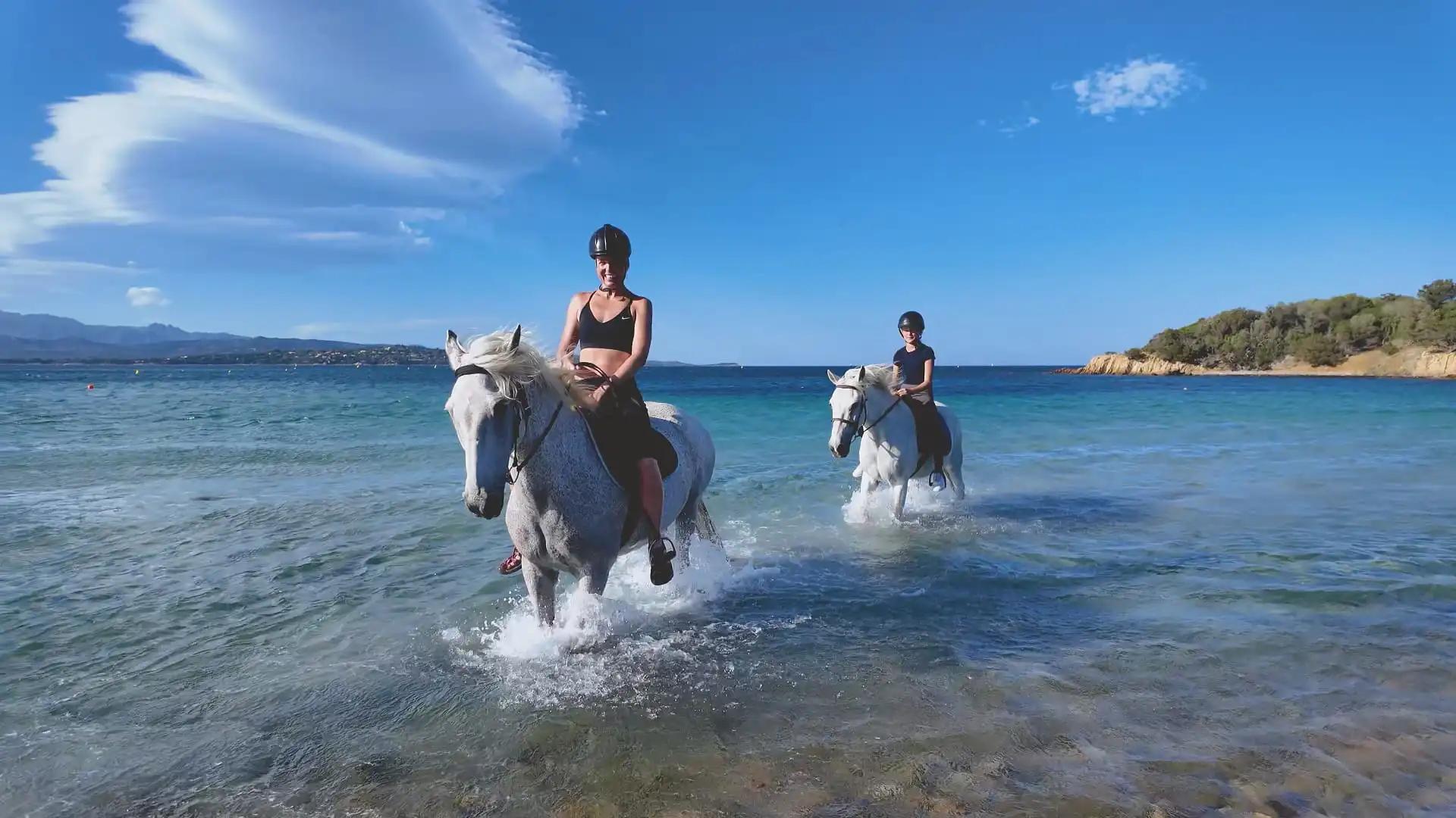 Horse riding on the beach at La Chiappa