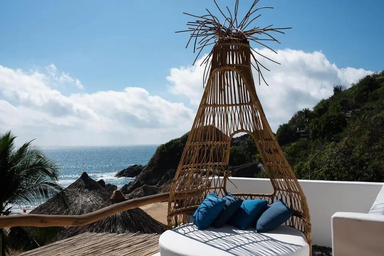 The beach is clothing optional but El Alquimista Hotel is technically not