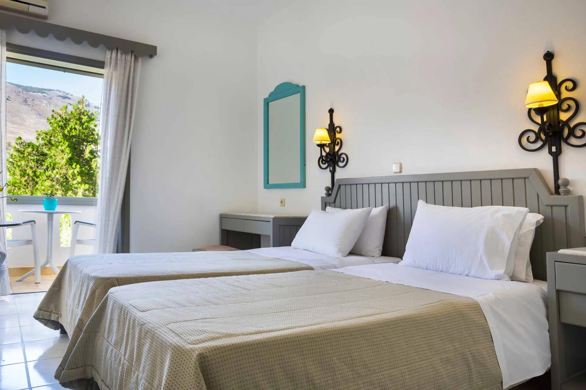 Comfy rooms at Vritomartis Naturist Resort