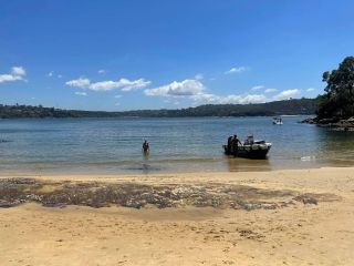 The 'Ice Cream Kid' boat selling treats on Cobblers Beach