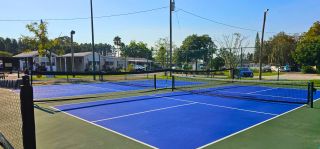 Tennis courts at Lake Como Family Nudist Resort