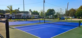 Tennis courts at Lake Como Family Nudist Resort