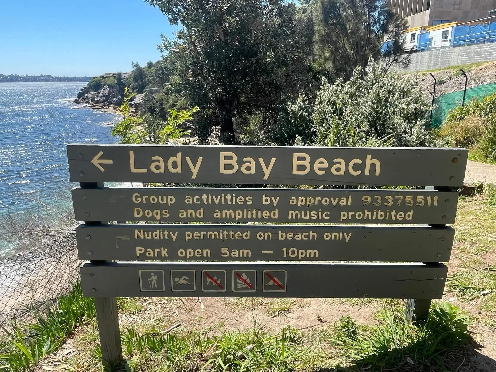 Welcome sign! The path continues above the beach here. Watch for curious walkers!