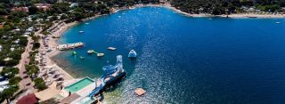 View from above of Valalta Nude Beach and the resort