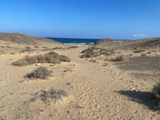 The large sandhill at Playa Caleta del Congrio you'll need to walk down and climb out to reach the parking area