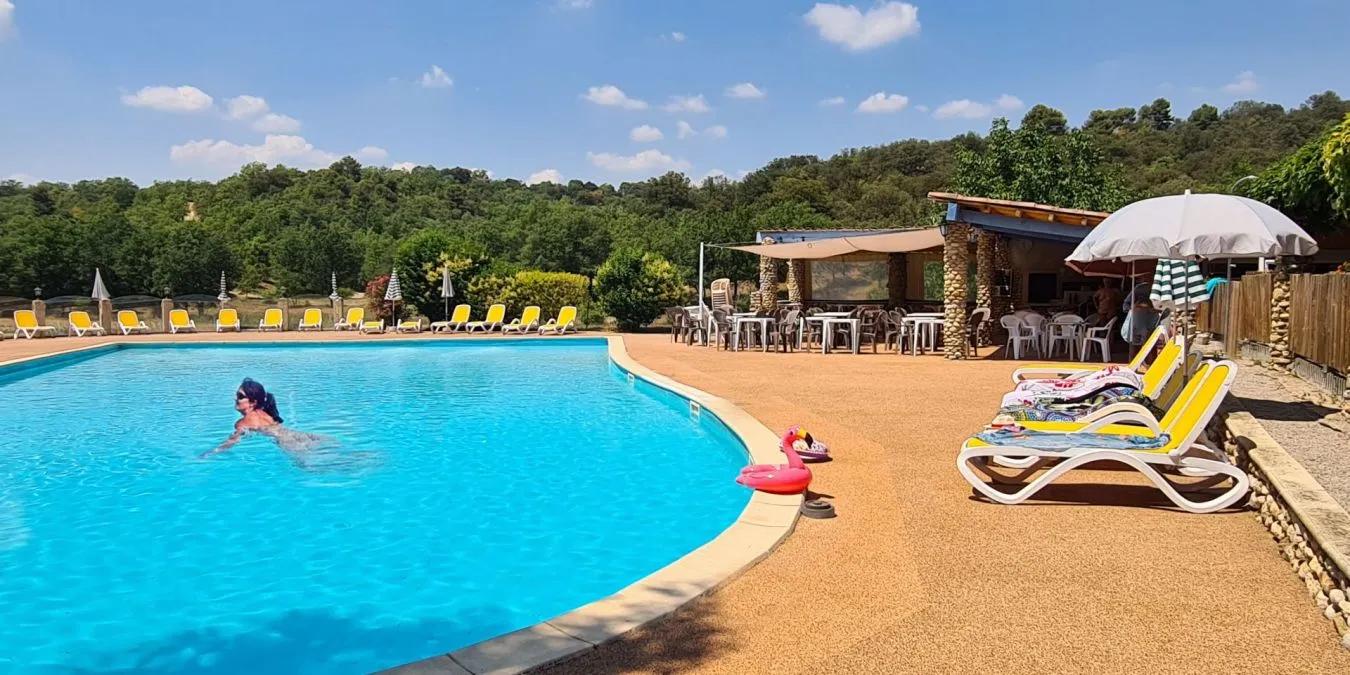 Pool area at Camping Petit Arlane
