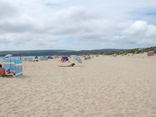 Golden sands and a warm day at Studland Naturist Beach