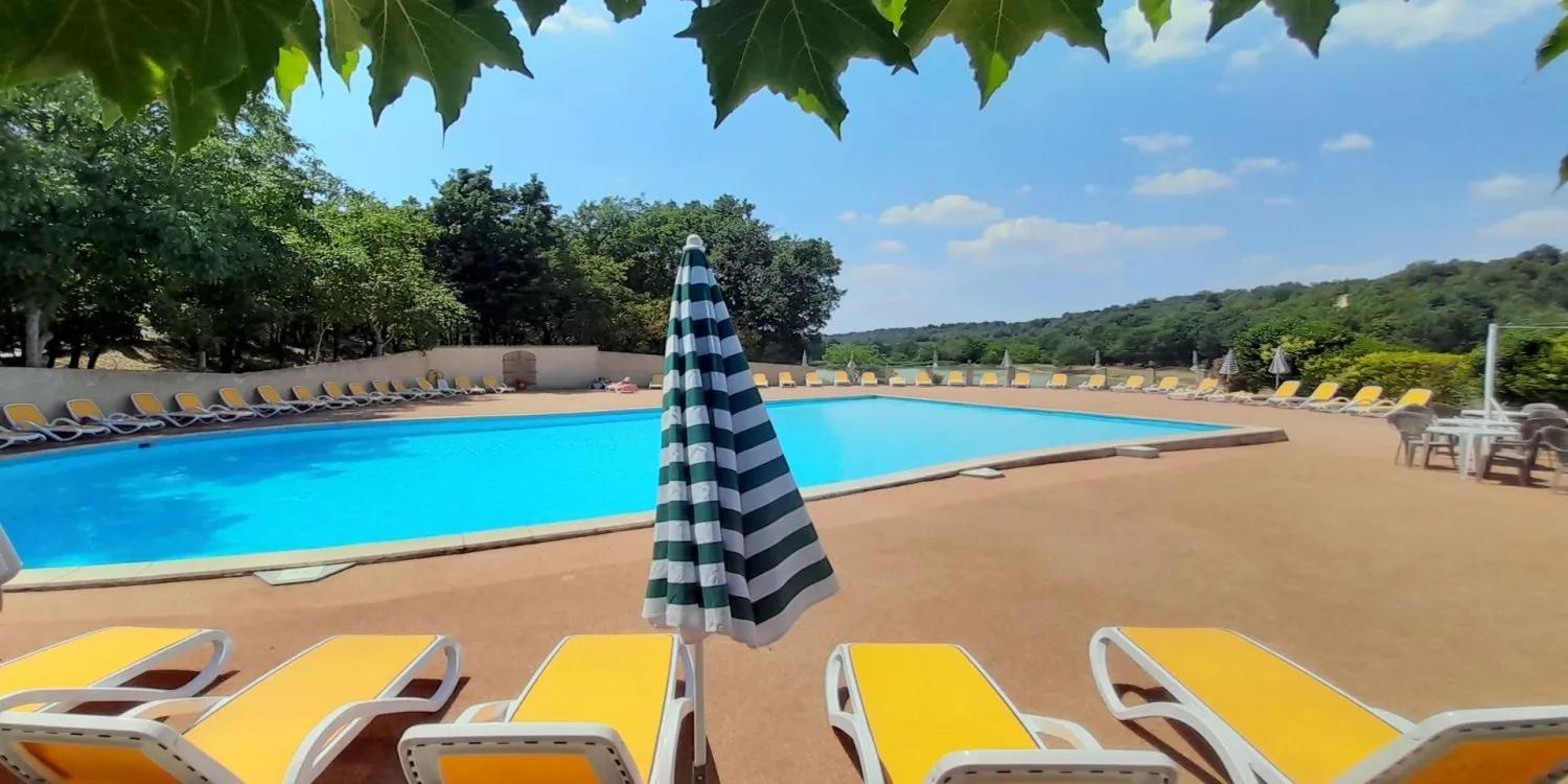 Clothing optional pool at Camping Naturiste Tikayan Petit Arlane