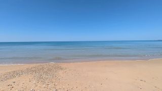 Calm ocean at Plage Naturiste du Petit Pont