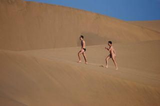 Playa de Maspalomas in Las Palmas Spain - naturists on the dunes