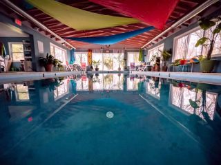 Indoor pool at Pine Tree Associates - naturist resort Maryland