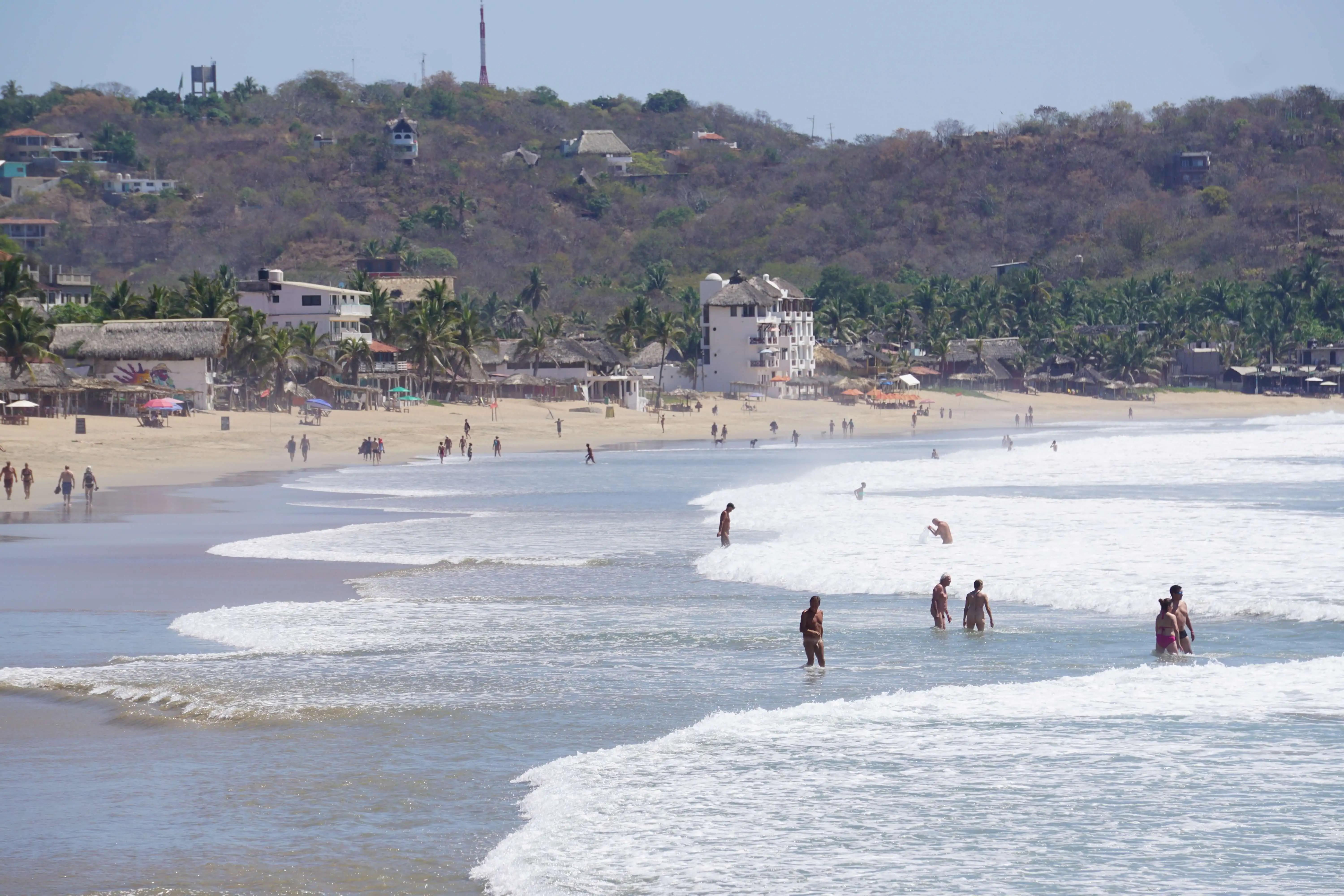 Zipolite's surf can be dangerous at times, lifeguards will signal where to swim