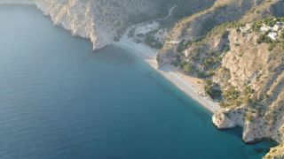 Aerial view of stunning Playa de Cantarrijan - a nude paradise