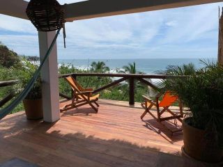 Views of the quiet cove at El Alquimista Hotel