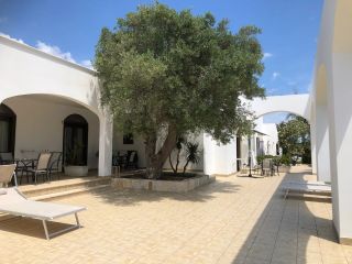 Plenty of room for relaxing outdoors at Resort Naturista Grottamiranda in Puglia, Italy