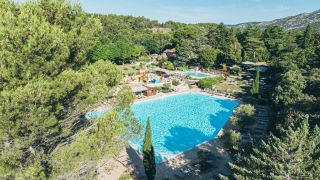 Naturist pool surrounded by nature at Domaine de Bélézy