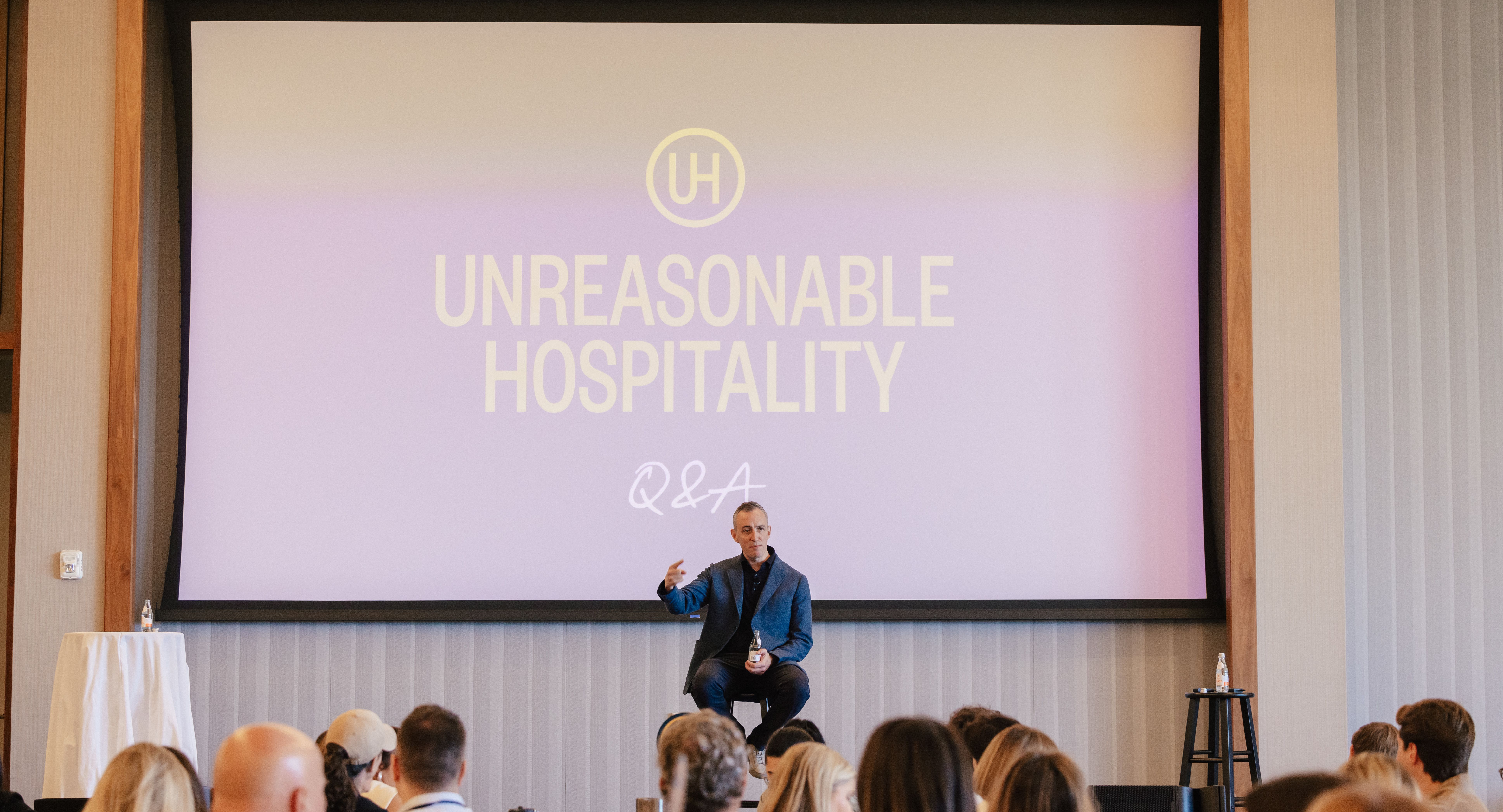 Will Guidara onstage at The Summit