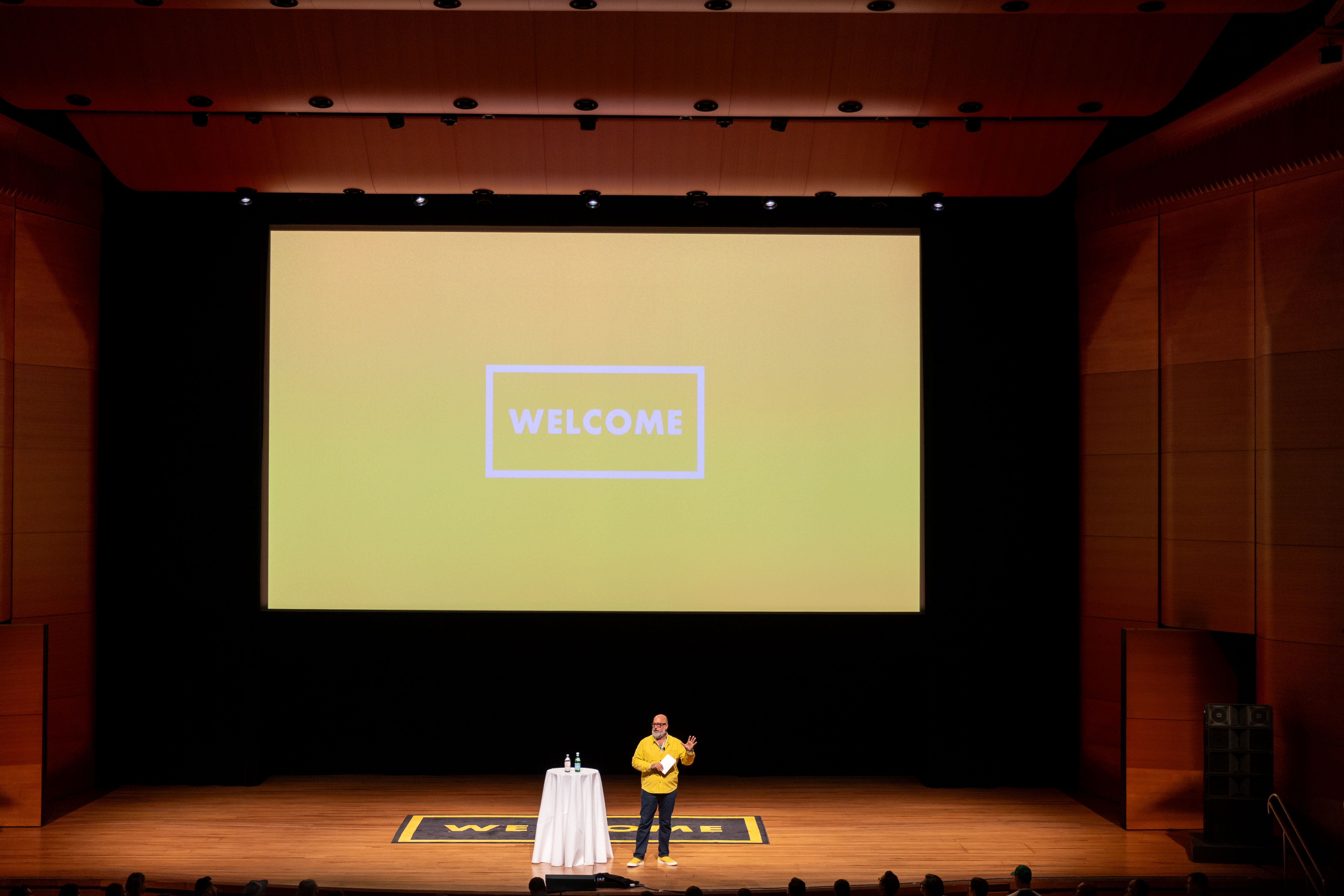 Andrew Zimmern onstage at Welcome