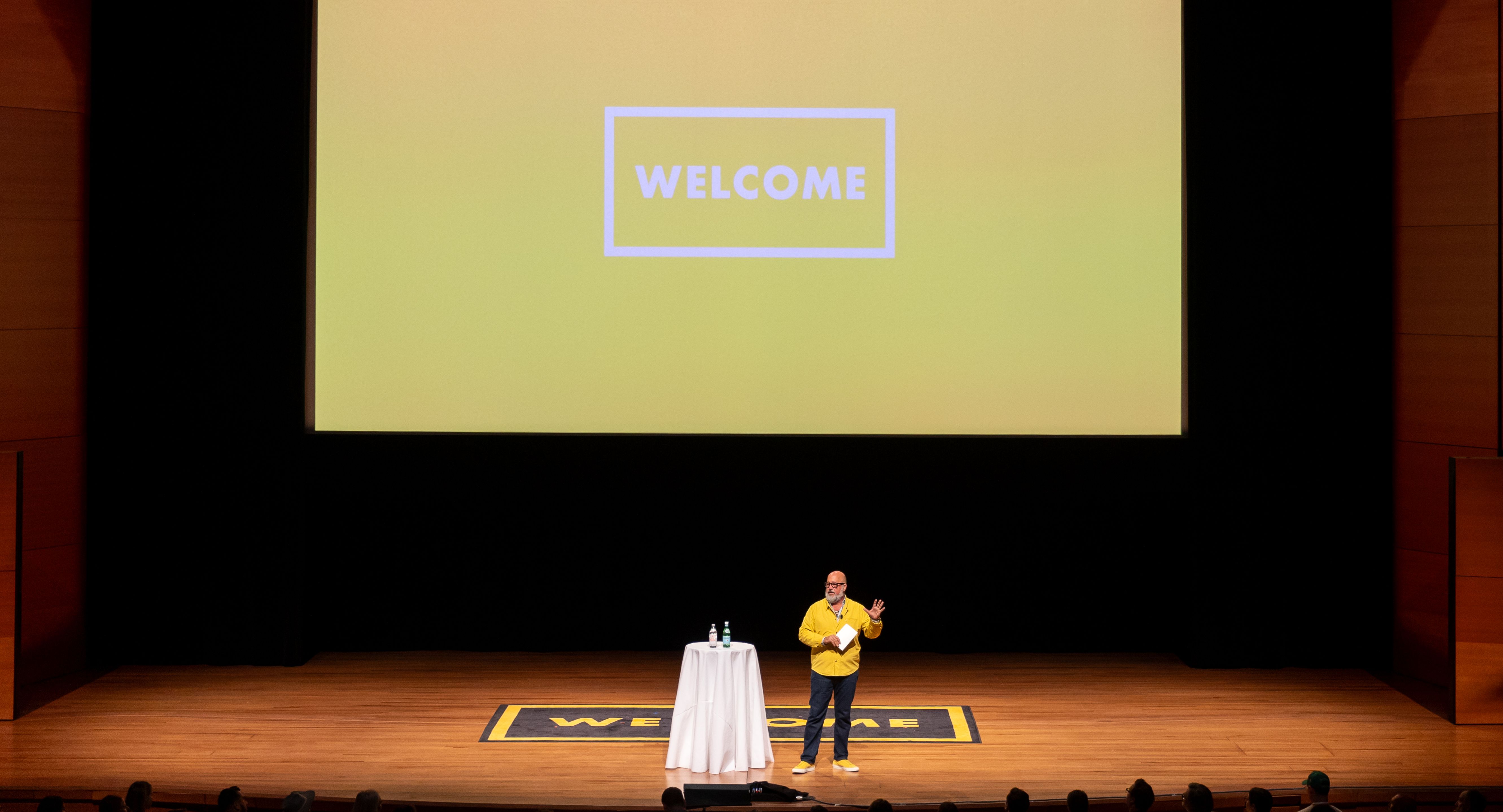 Andrew Zimmern onstage at Welcome
