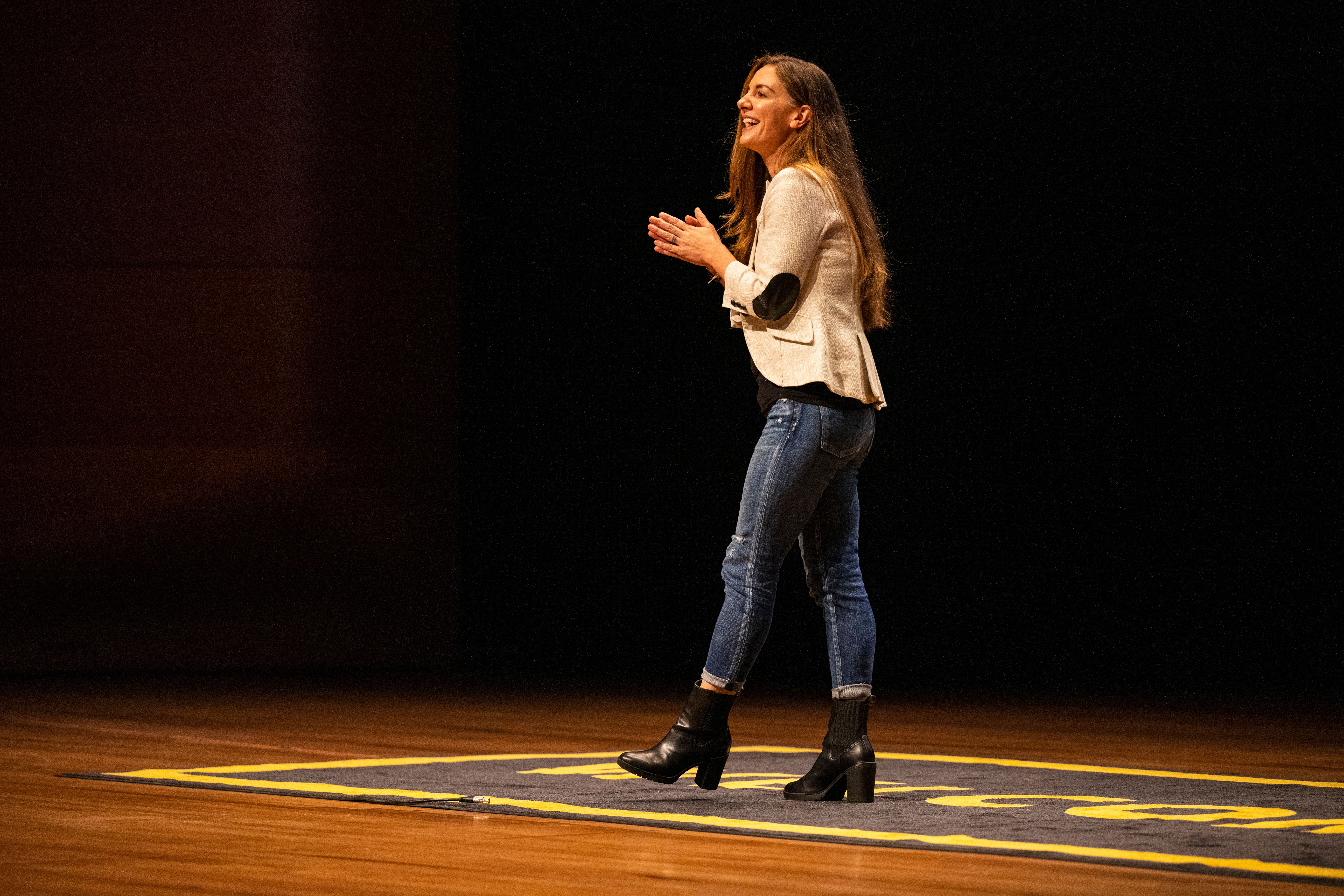 Kat Cole onstage at Welcome