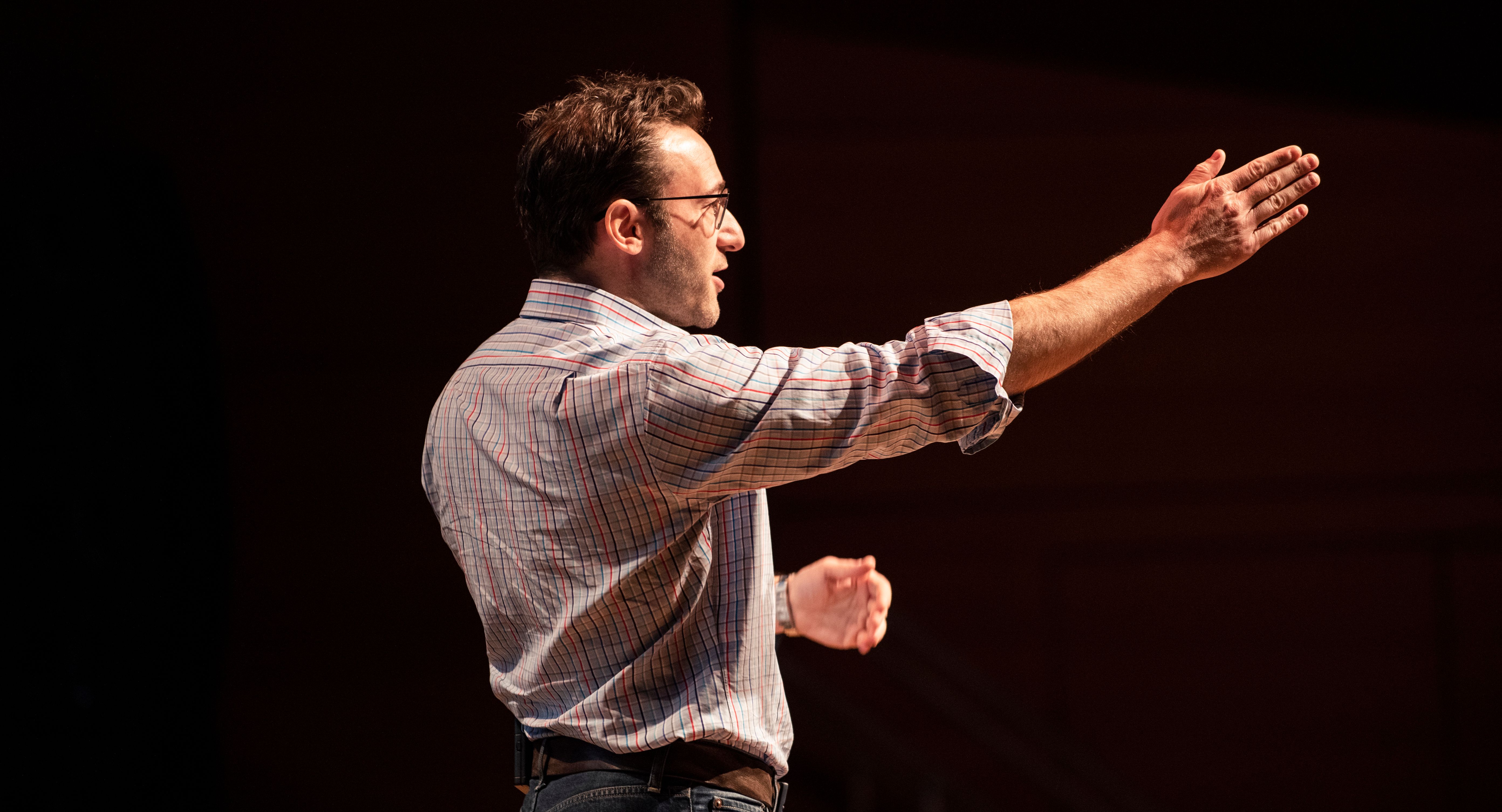 Simon Sinek onstage at Welcome