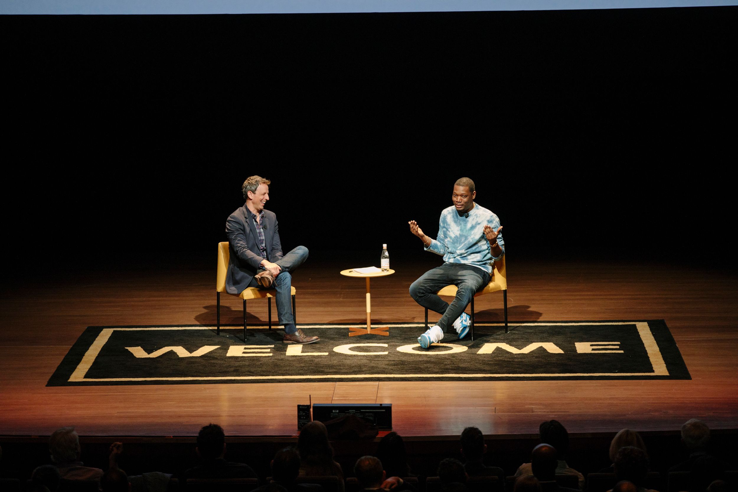 Seth Meyers and Michael Che onstage at Welcome