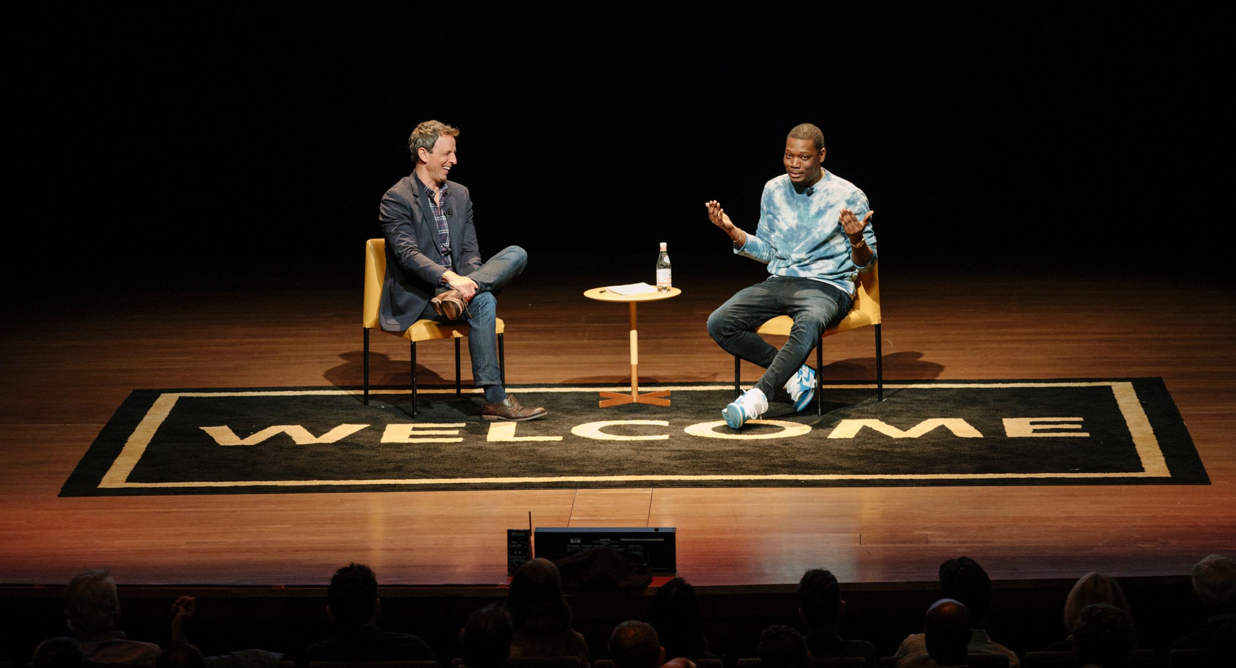 Seth Meyers and Michael Che onstage at Welcome
