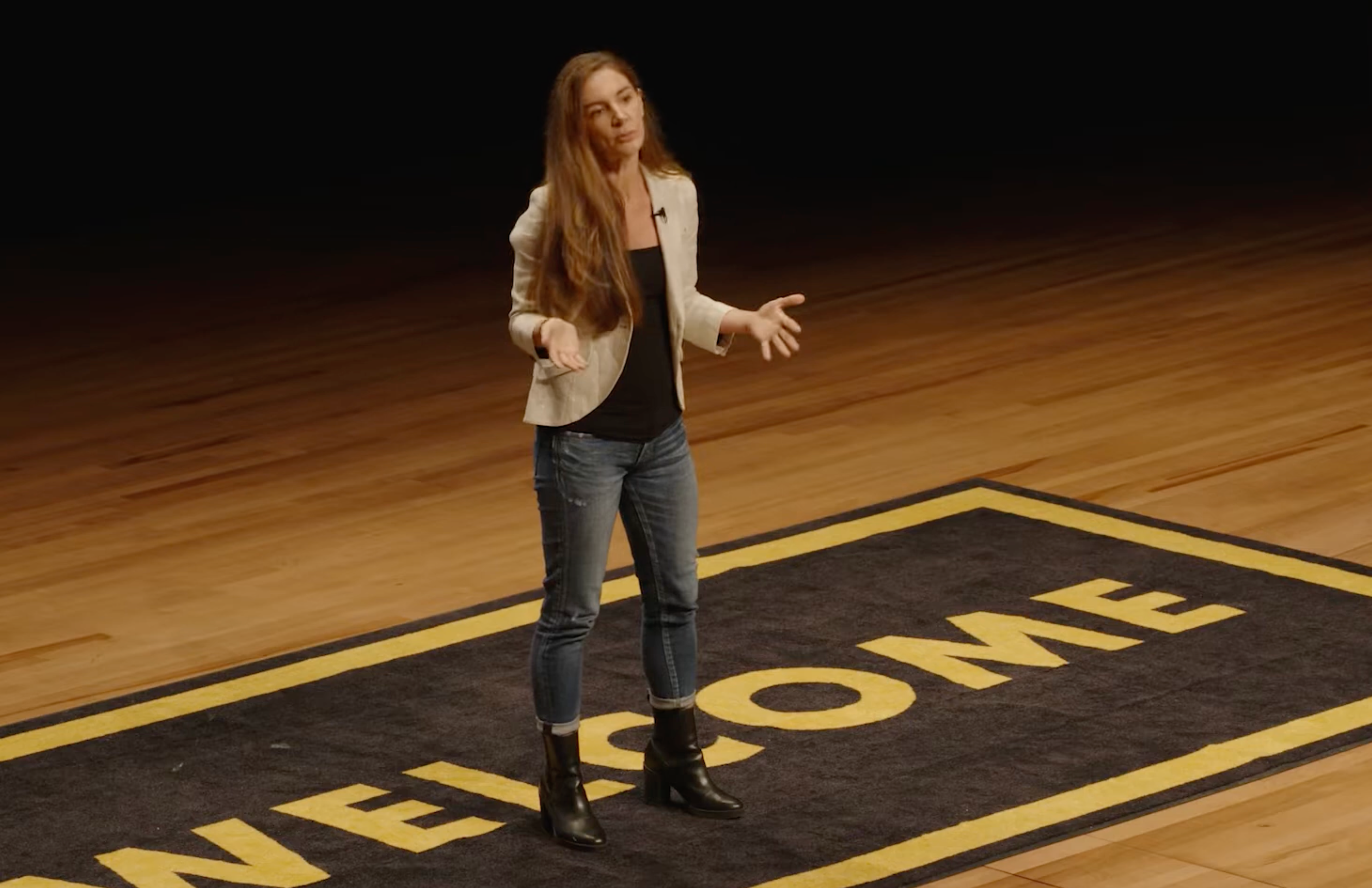 Kat Cole onstage at Welcome