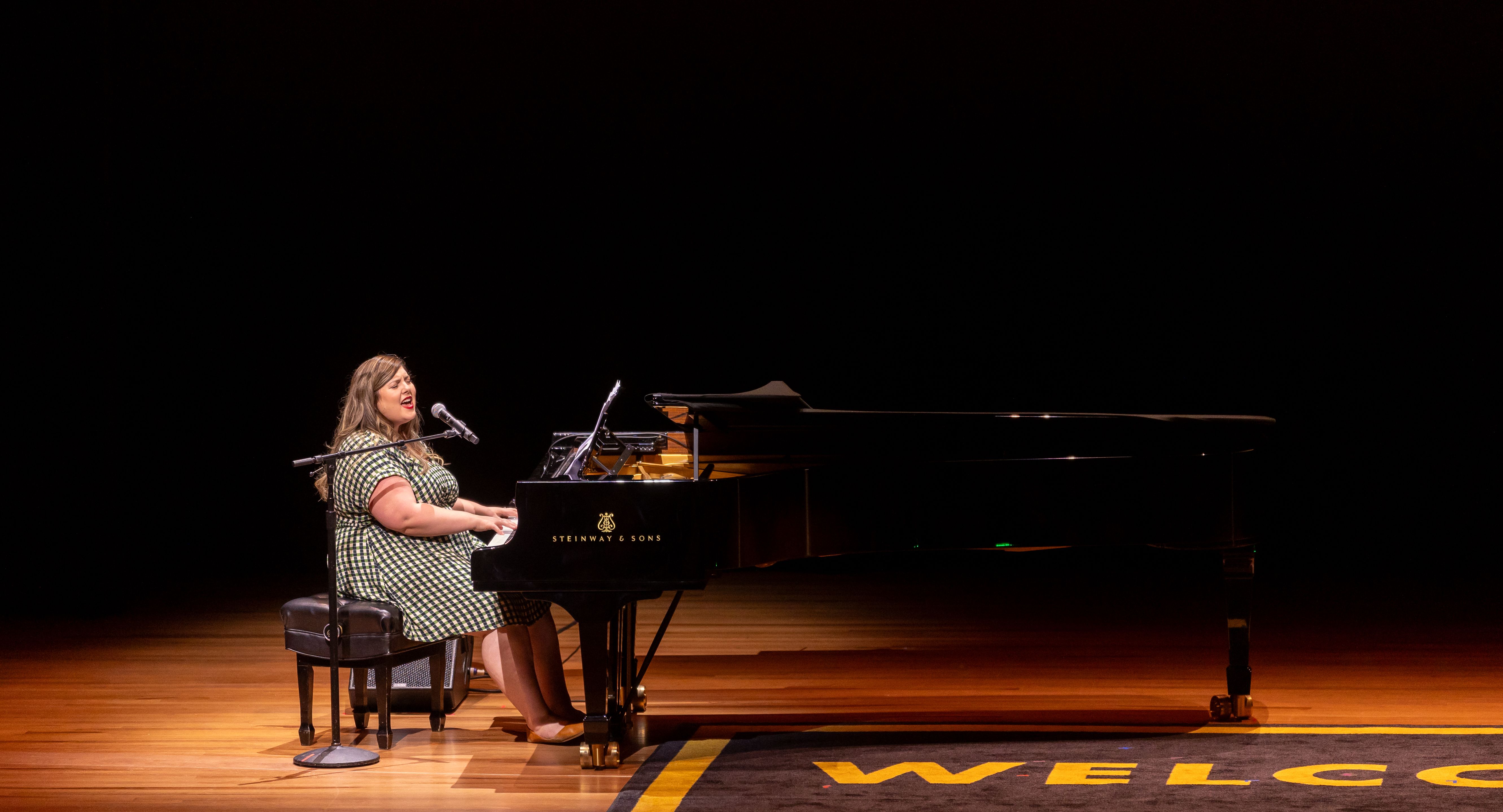 Mary Lambert onstage at Welcome