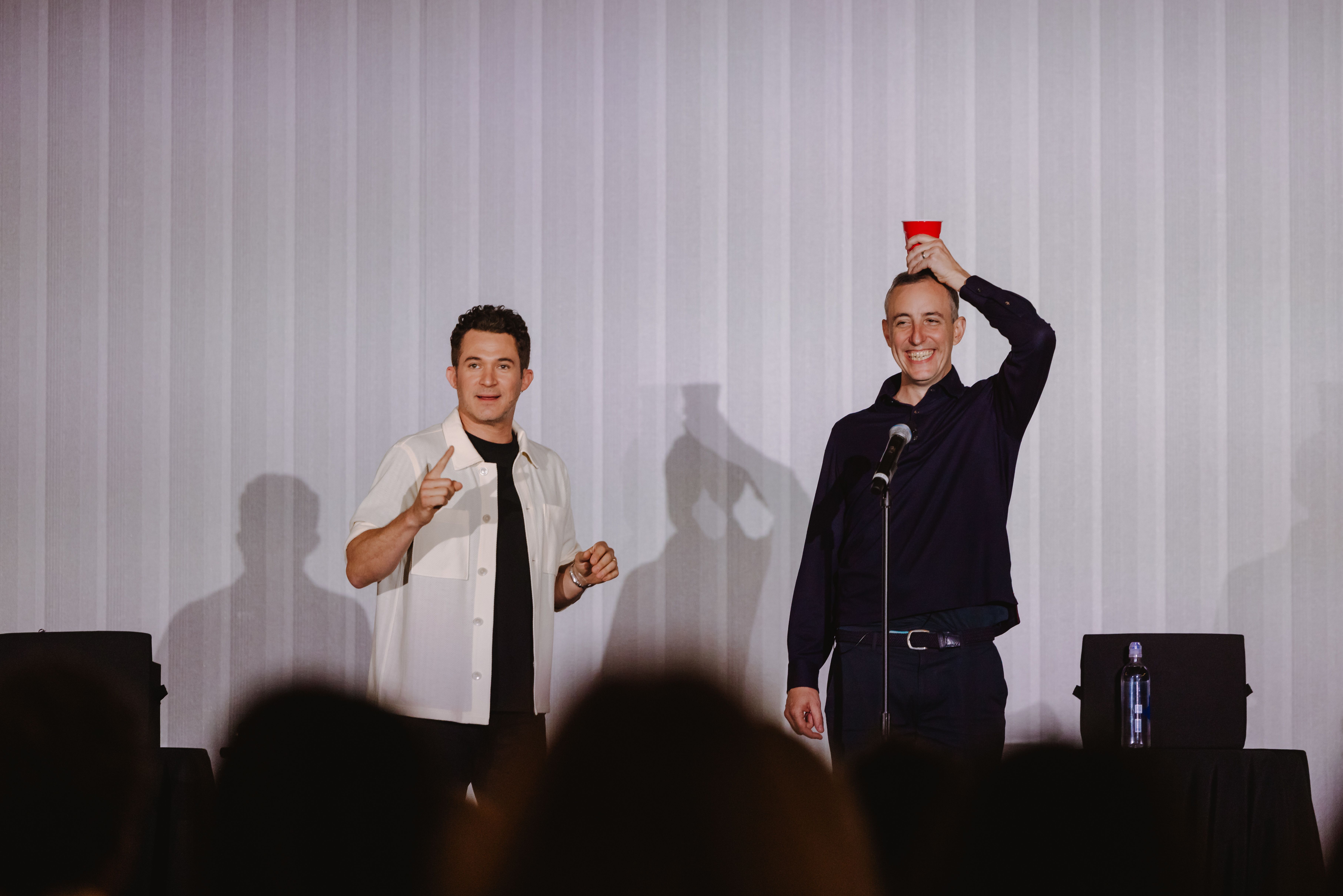 Justin Willman and Will Guidara onstage at The Summit