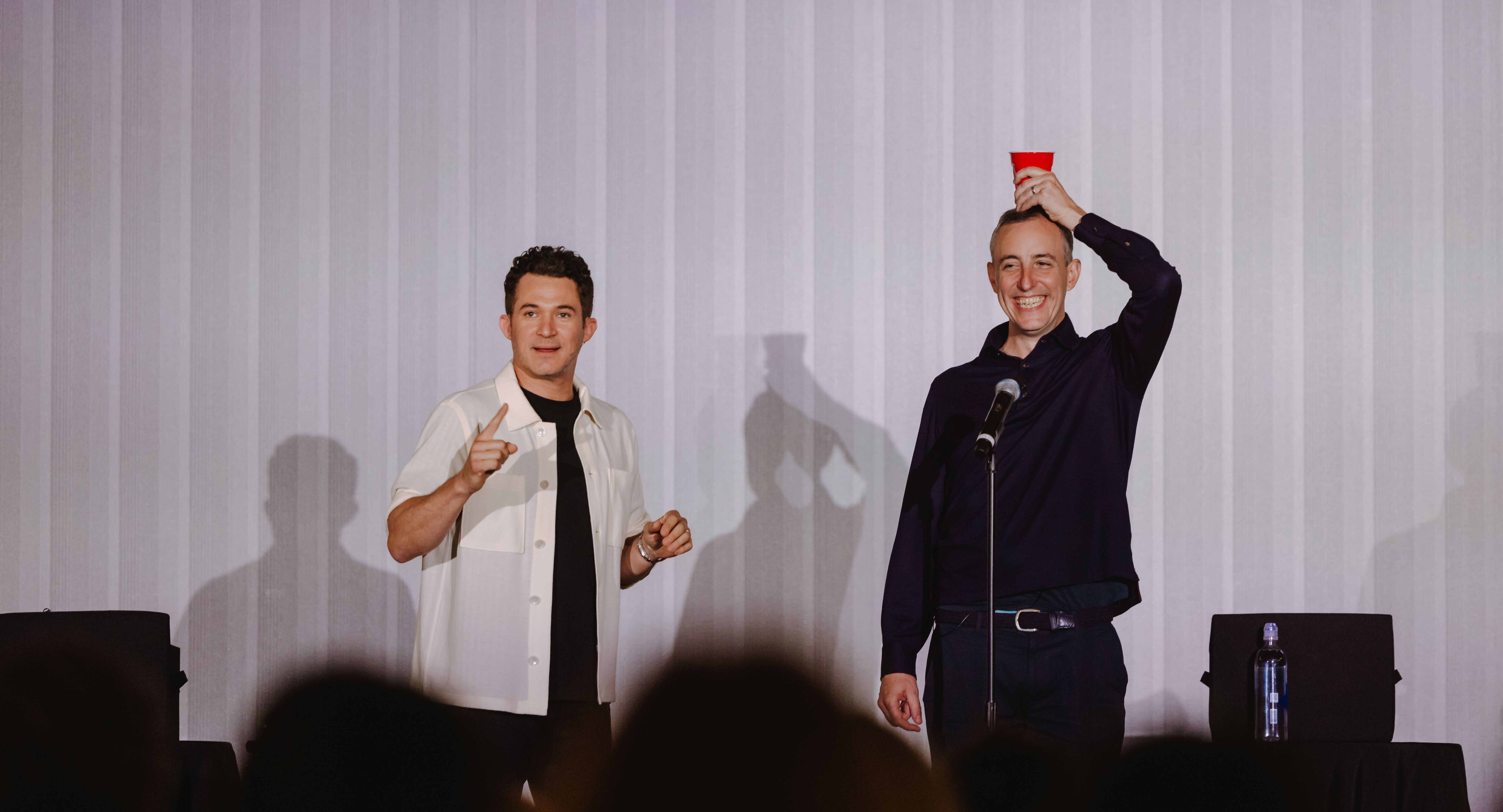 Justin Willman and Will Guidara onstage at The Summit