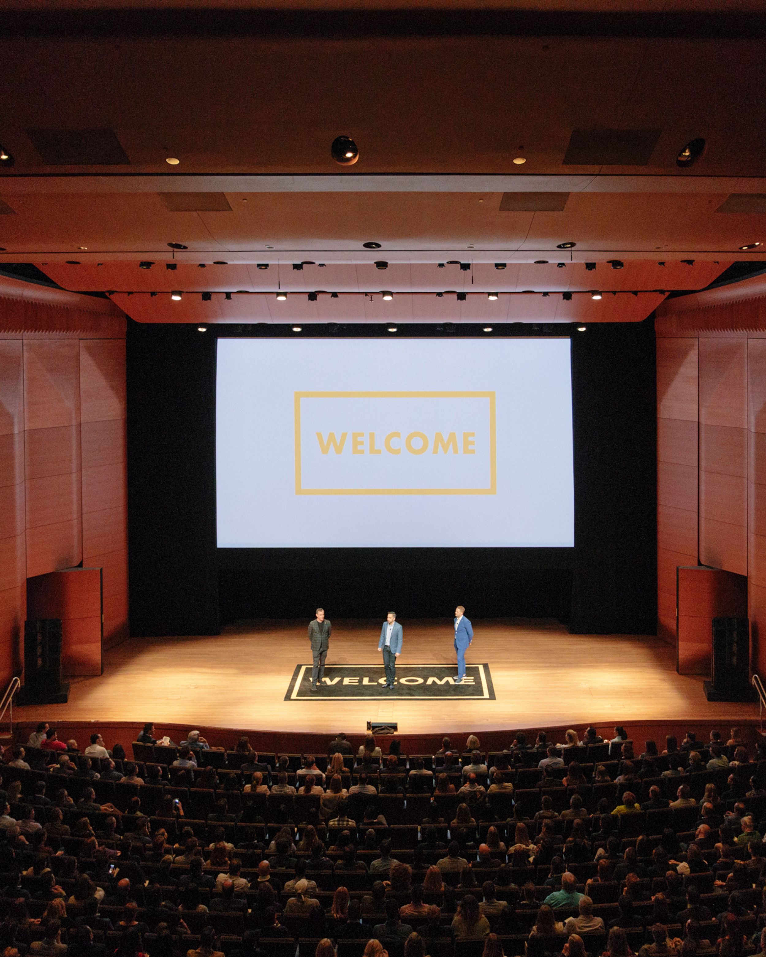 3 speakers onstage at The Welcome Conference
